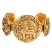 A Chanel 24ct gold-plated five-medallion bangle, circa 1986.