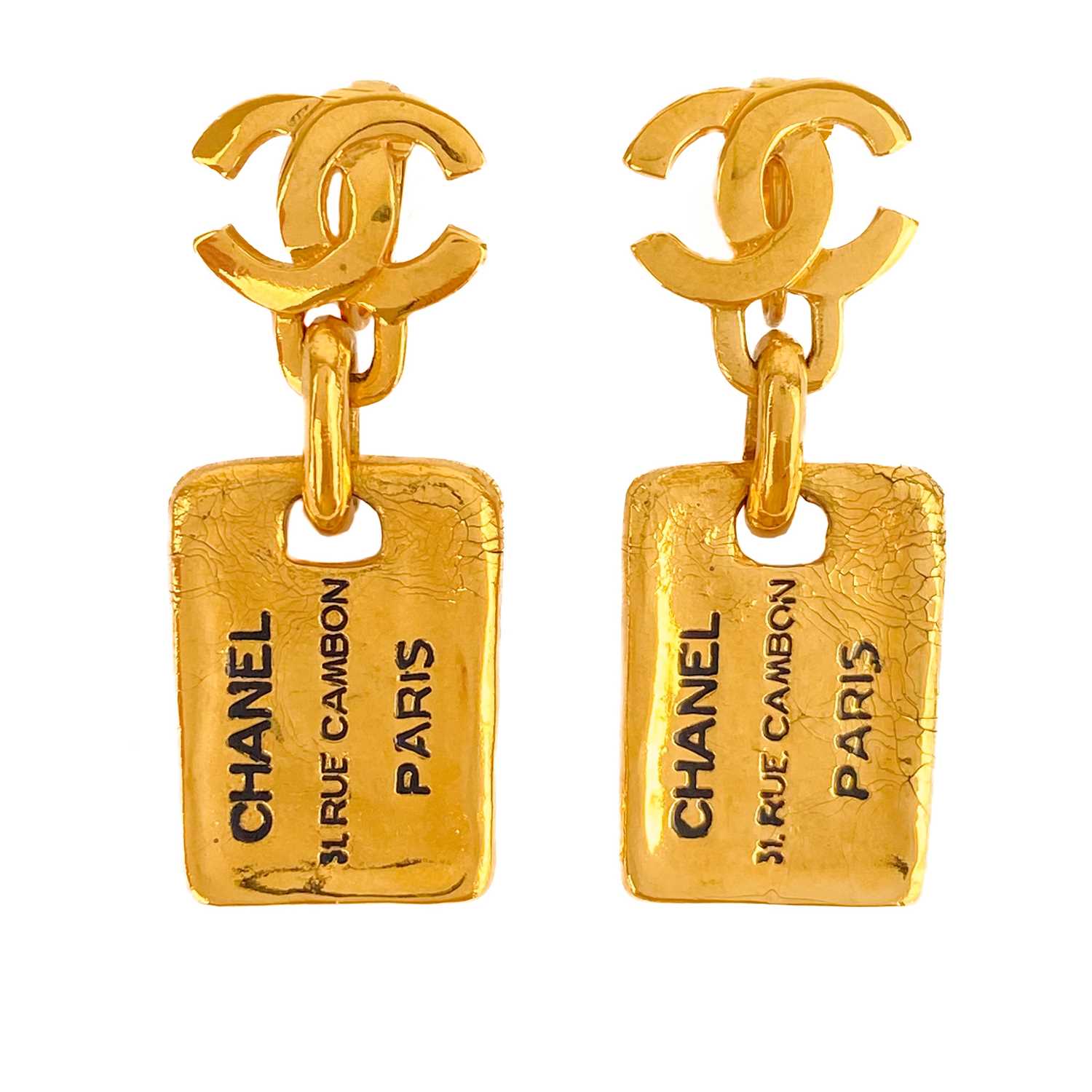 A Chanel 24ct gold-plated pair of CC and label pendant earrings, circa 1980's.