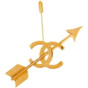 A Chanel 24ct gold-plated CC and arrow lapel pin, circa 1993.