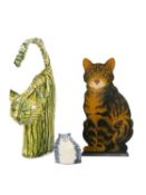 A clowder of cat sculptures Including a Ginnie Bamford ceramic