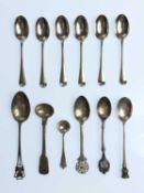 A collection of hallmarked silver spoons.