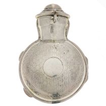 A silver perfume bottle holder.