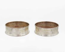A pair of Contemporary silver wine coasters by M C Hersey & Son Ltd.