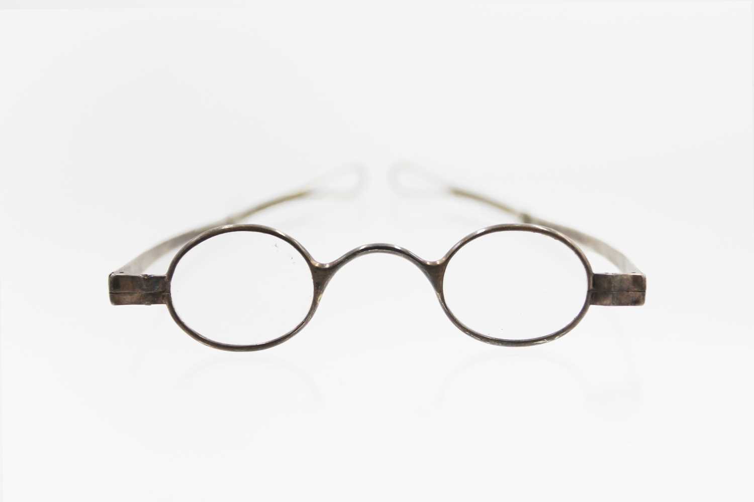 A pair of George III silver framed spectacles possibly by John Shekleton.