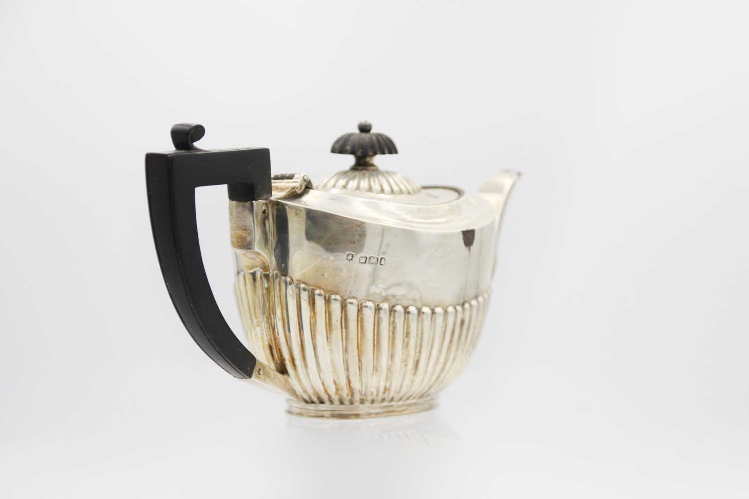 A Victorian silver half-fluted bachelor teapot by James Dixon & Son. - Image 3 of 3