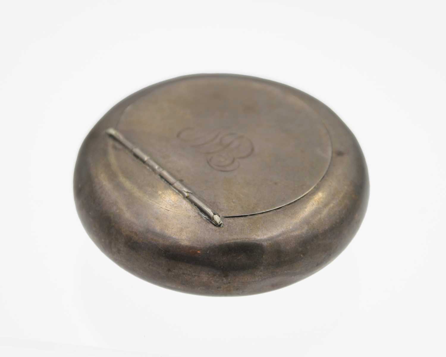 A George V silver squeeze tobacco box by Charles S Green & Co.