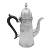 An Edwardian silver coffee pot by George Nathan & Ridley Hayes.