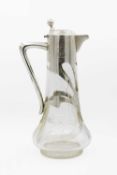 An early 20th century Austrian Art Nouveau cut glass 800 silver mounted claret jug by Herman Suedfie
