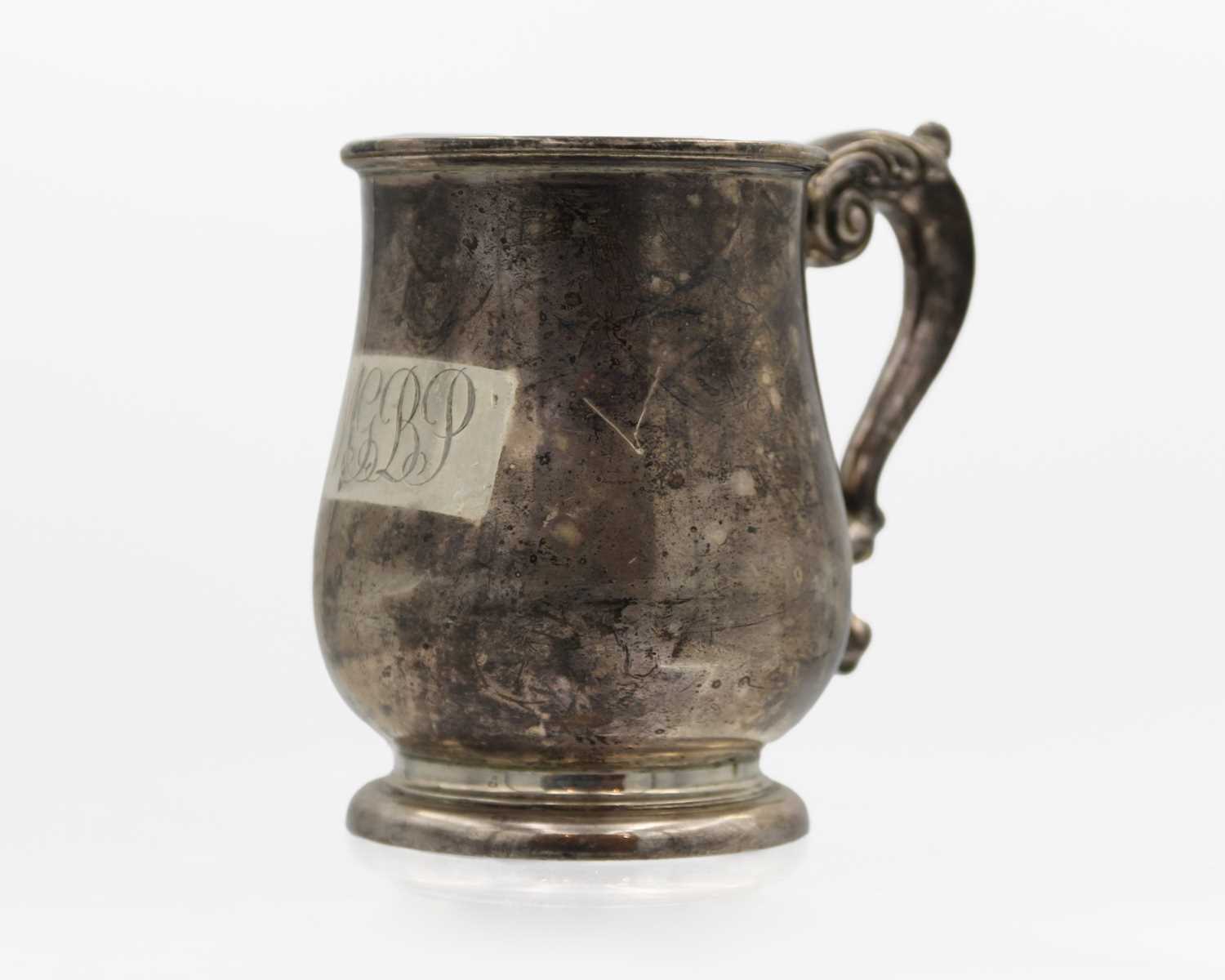 A George V silver baluster mug by William Neale & Sons Ltd.