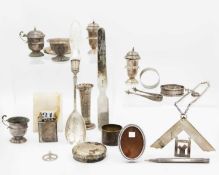 A collection of various silver items.