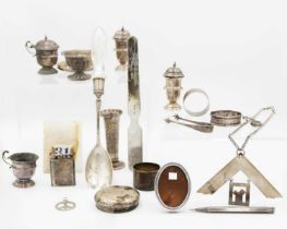 A collection of various silver items.