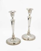 An Edwardian silver good pair of candlesticks by Fordham & Faulkner.