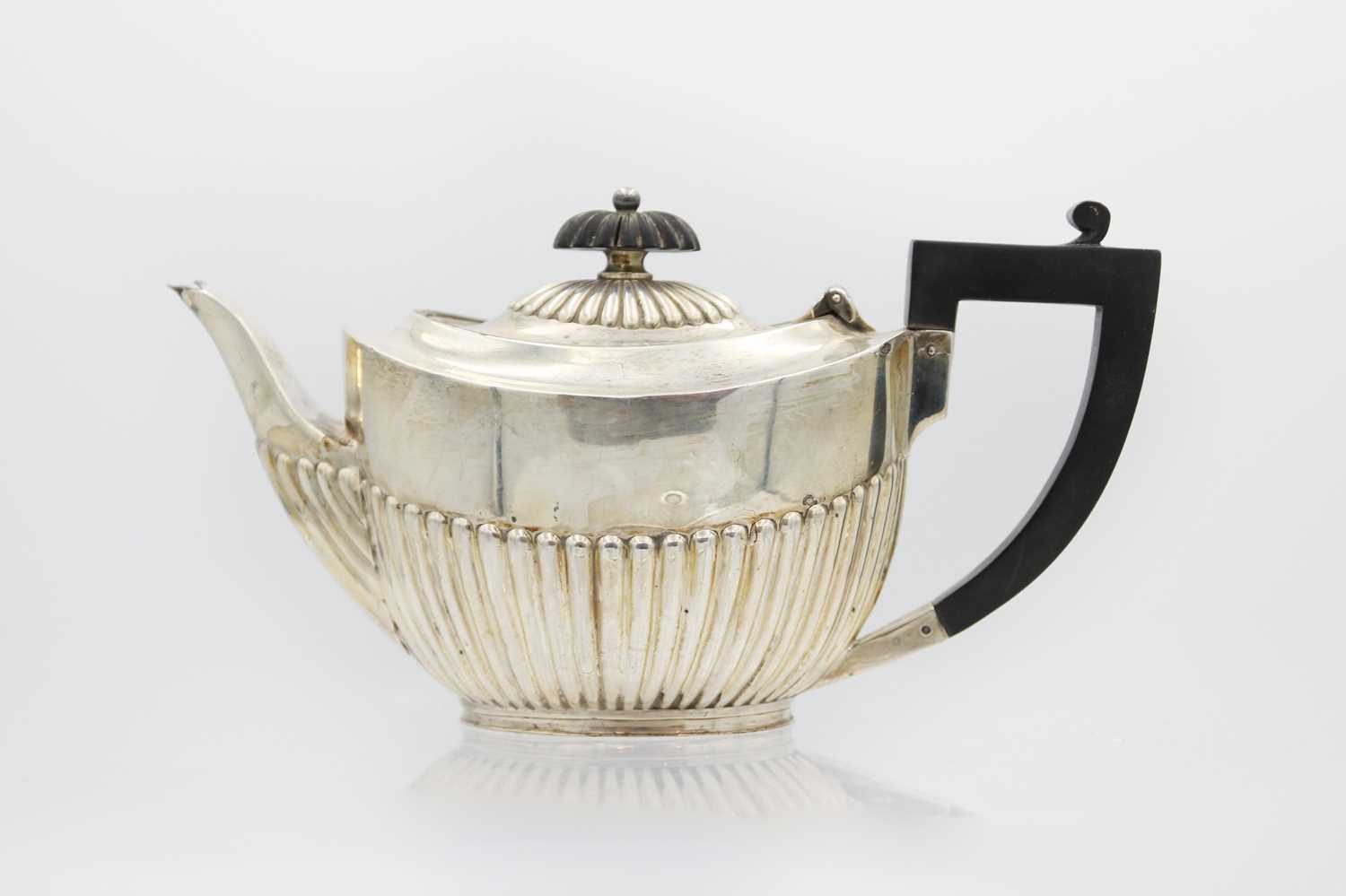 A Victorian silver half-fluted bachelor teapot by James Dixon & Son. - Image 2 of 3