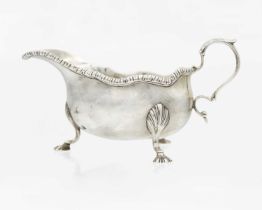 An Edwardian silver gravy boat by Emma Doxey.