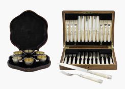 A Victorian cased set of six silver-plated salts and spoons.