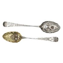 A matched pair of Georgian silver berry spoons.