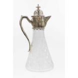 A modern silver mounted cut glass claret jug by Warwickshire Reproduction Silver.
