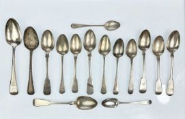 A collection of fifteen silver spoons.