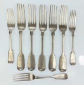 A collection of silver forks.
