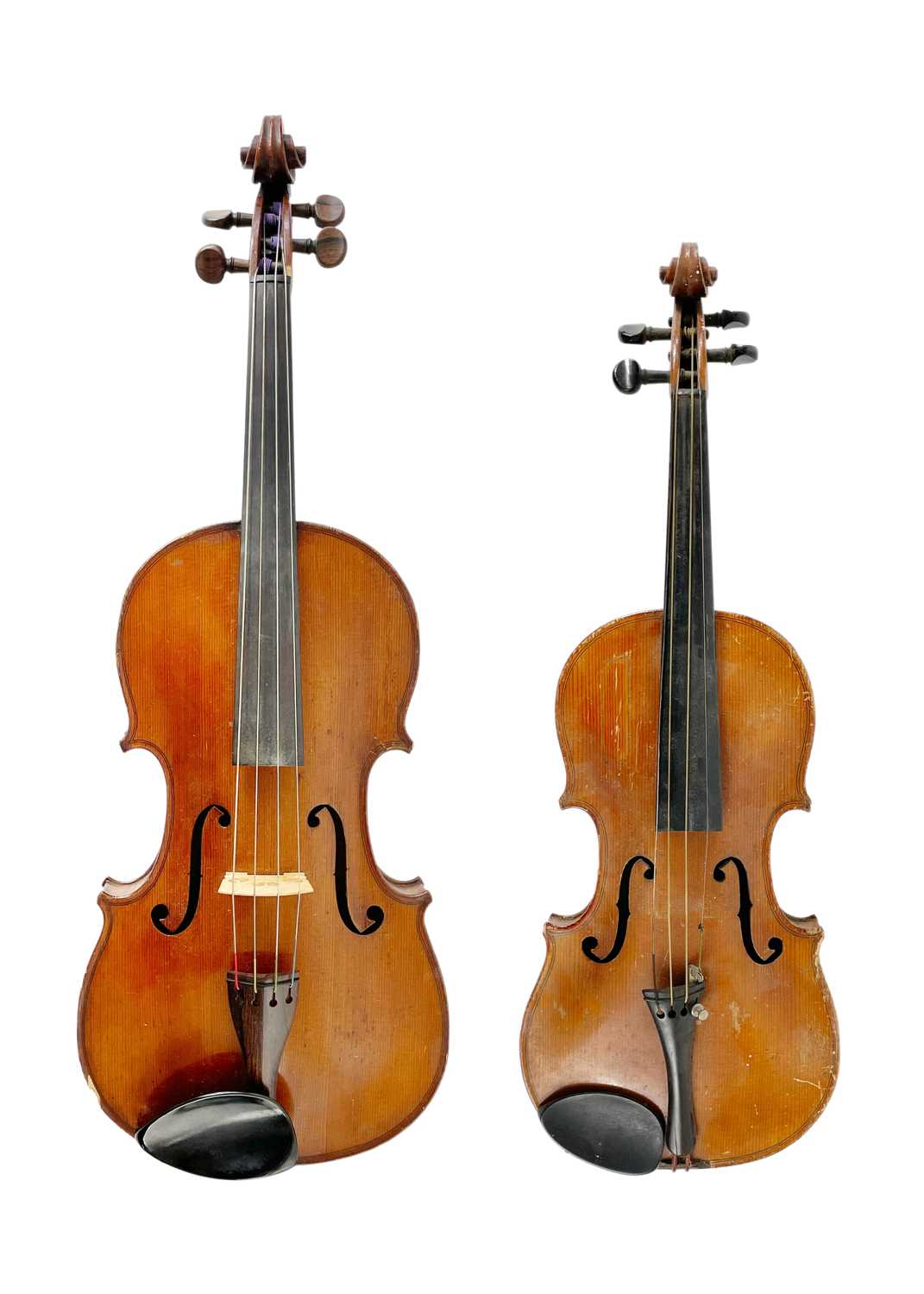 A viola and a violin, circa 1900.