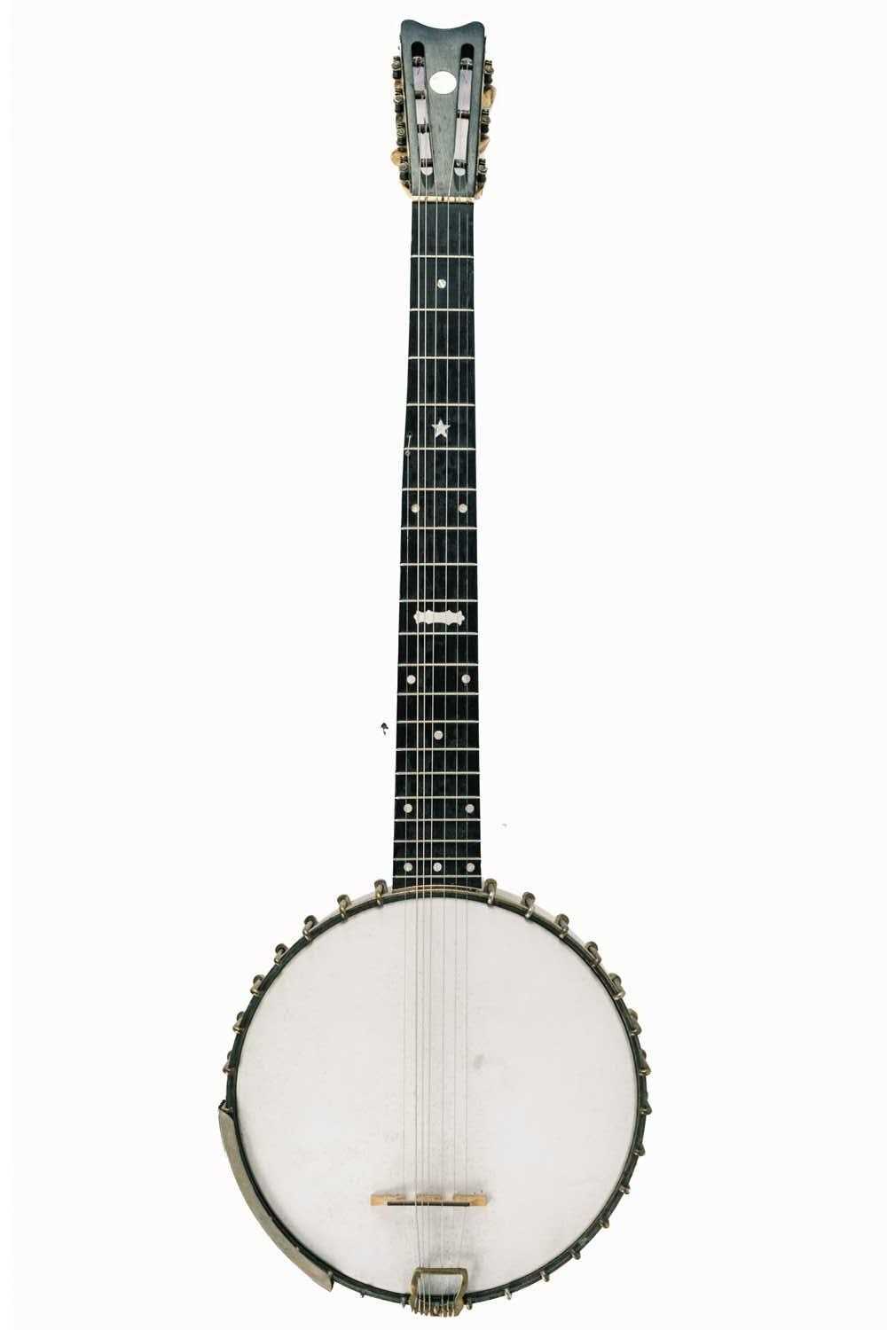 A George P. Matthews seven string banjo.