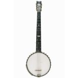 A George P. Matthews seven string banjo.