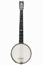 A George P. Matthews seven string banjo.