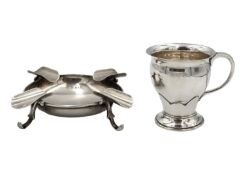 A George V silver mug by Charles S Green & Co, and a Victorian silver ashtray.