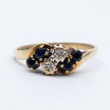 A 9ct yellow gold sapphire and diamond ring
