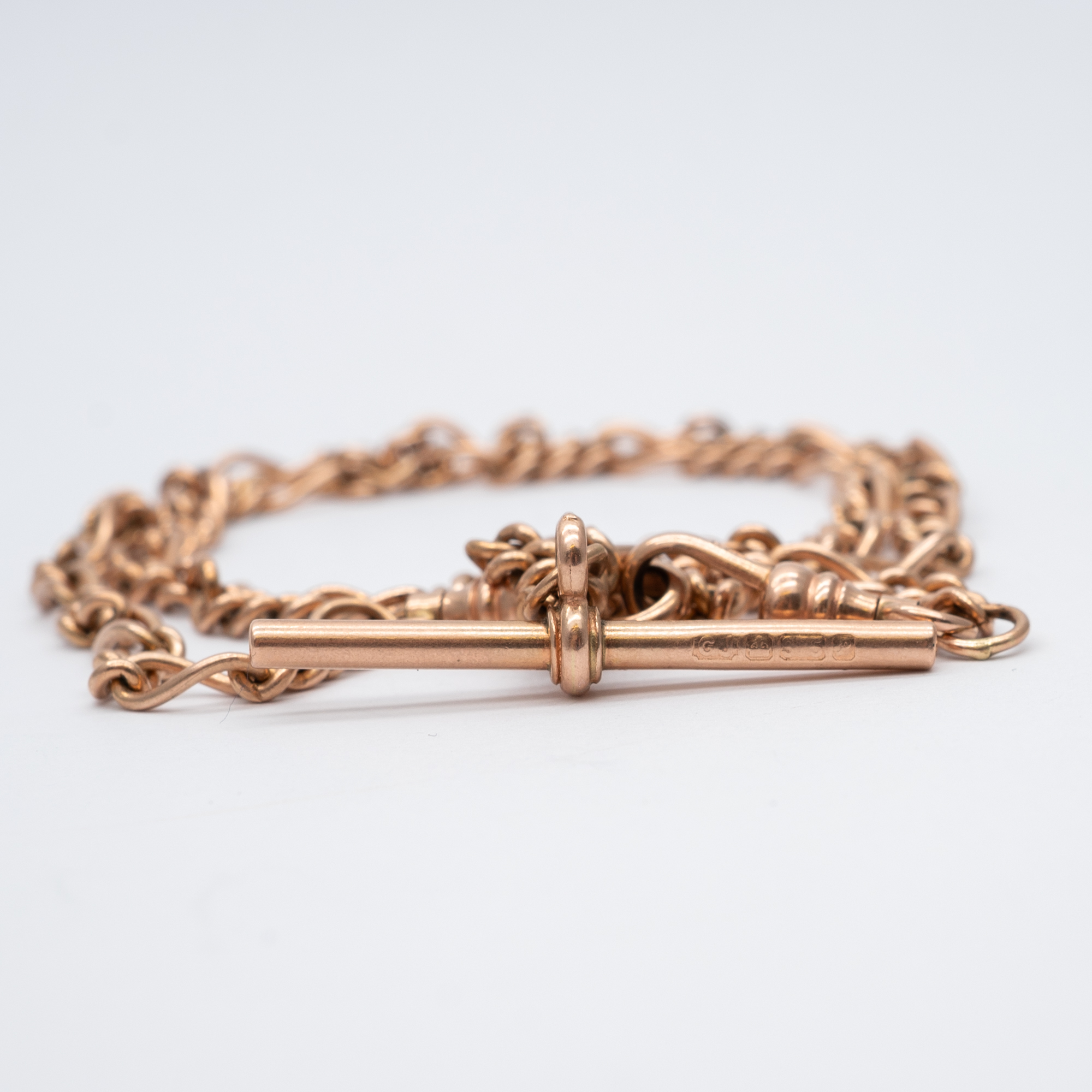 A 9ct rose gold solid linked albert chain - Image 3 of 4