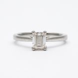A platinum emerald cut single solitaire diamond ring