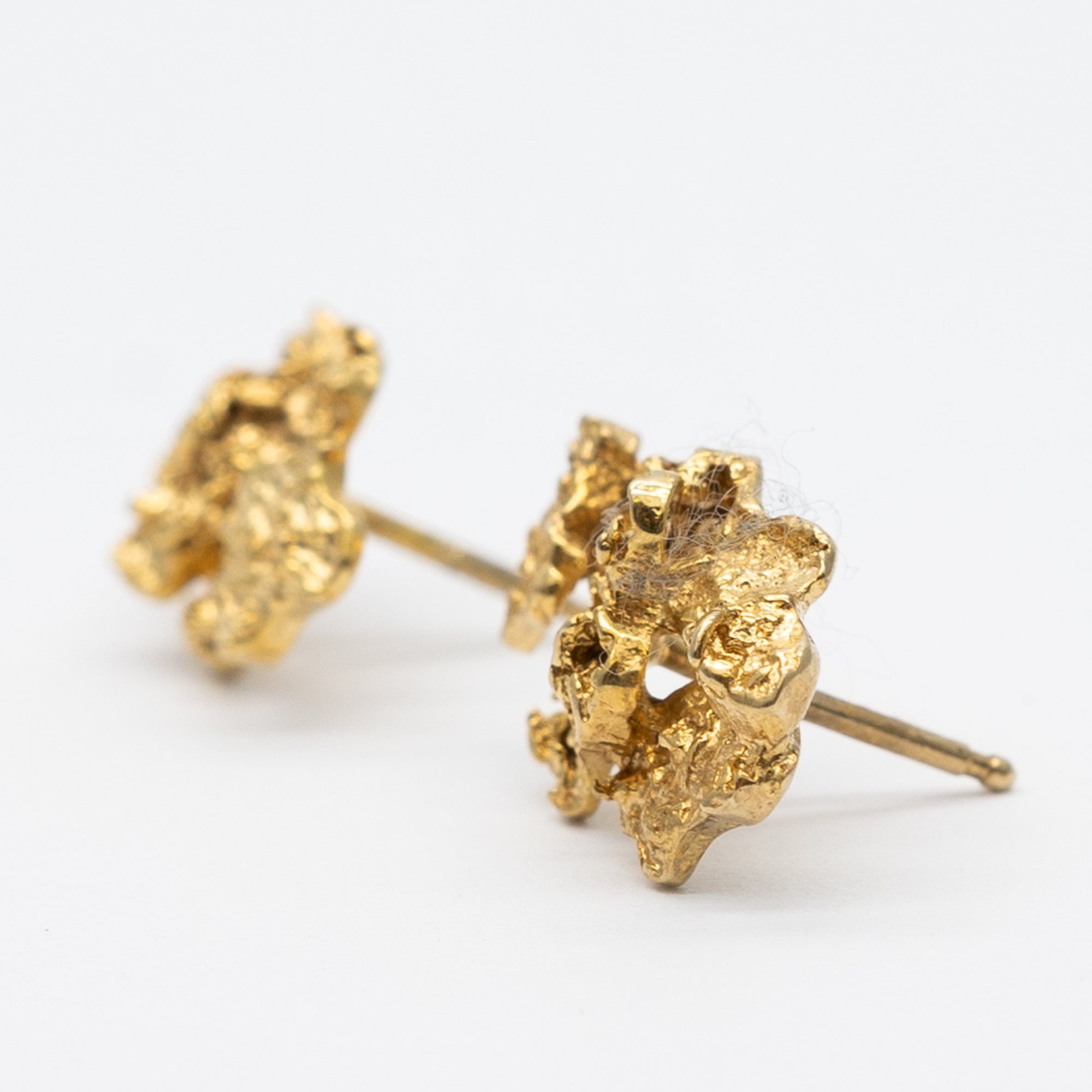 A pair of 9ct yellow gold nugget earrings