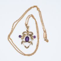A 9ct yellow gold amethyst and seed pearl pendant and chain