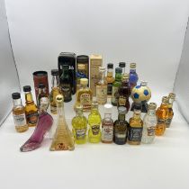 A large collection of miniature whisky and liquers