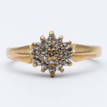 A 9ct yellow gold diamond cluster ring