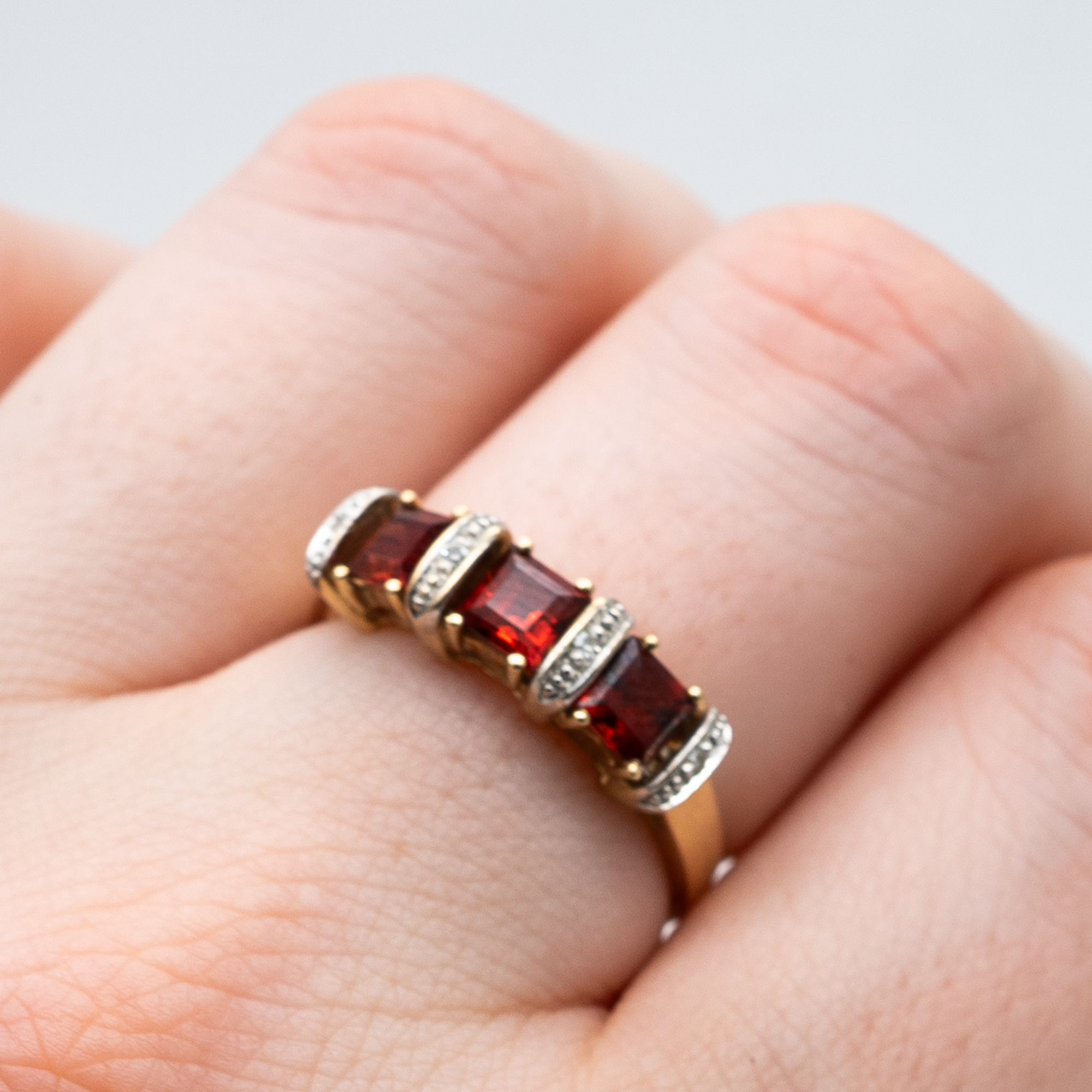 A 9ct yellow gold garnet and diamond dress ring - Image 4 of 4