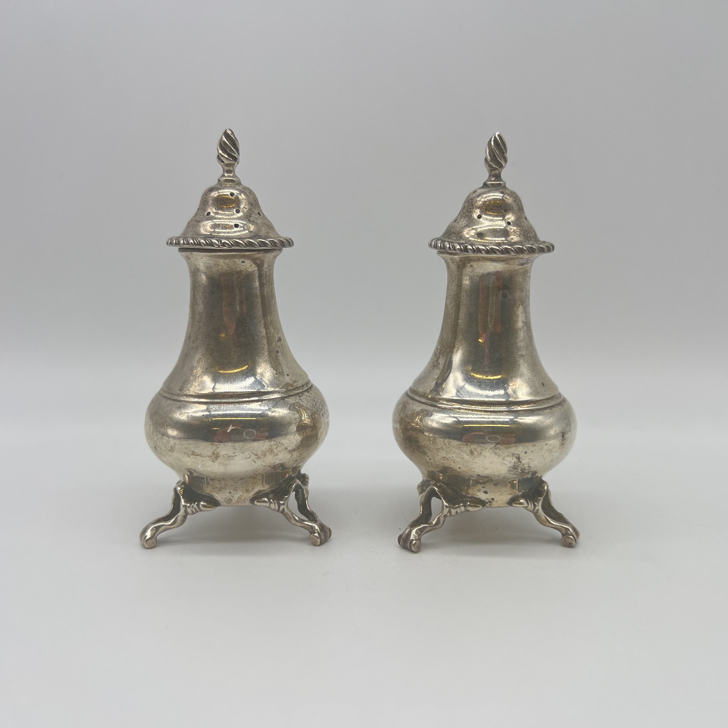 2x silver pepper pots