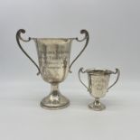 2x silver trophies