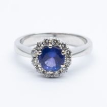 An 18ct white gold diamond and tanzanite ring