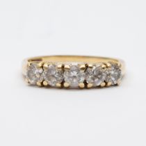 A 14ct yellow gold cz set eternity ring