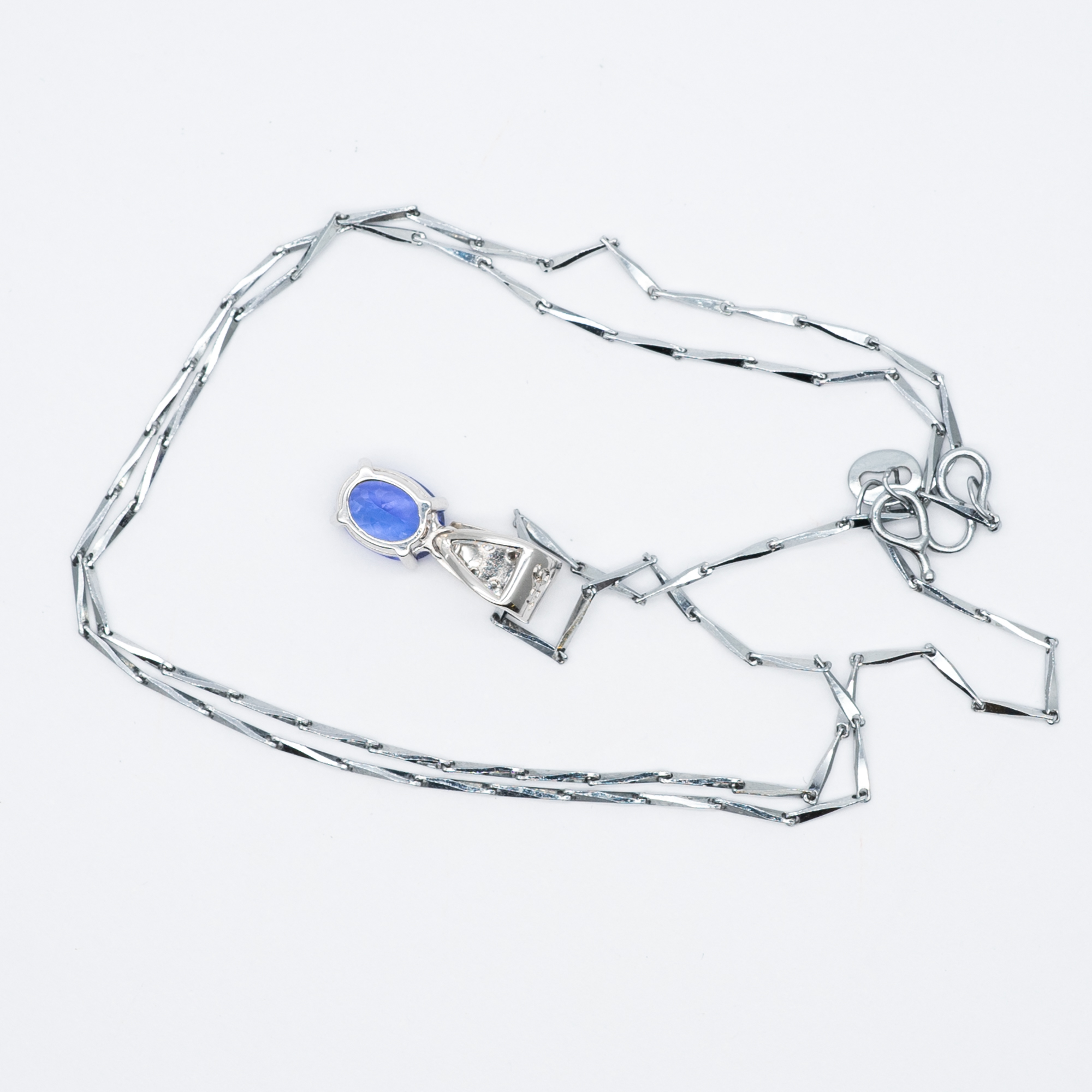 A 9ct white gold tanzanite and diamond pendant and chain - Image 3 of 4