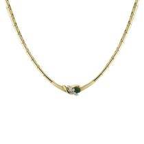 An 18ct yellow gold diamond and emerald necklace