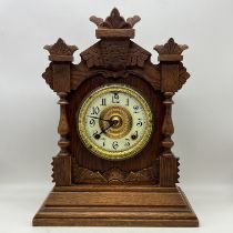 A vintage wooden mantel clock