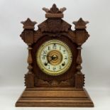 A vintage wooden mantel clock