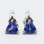 A pair of 14ct white gold tanzanite drop earrings