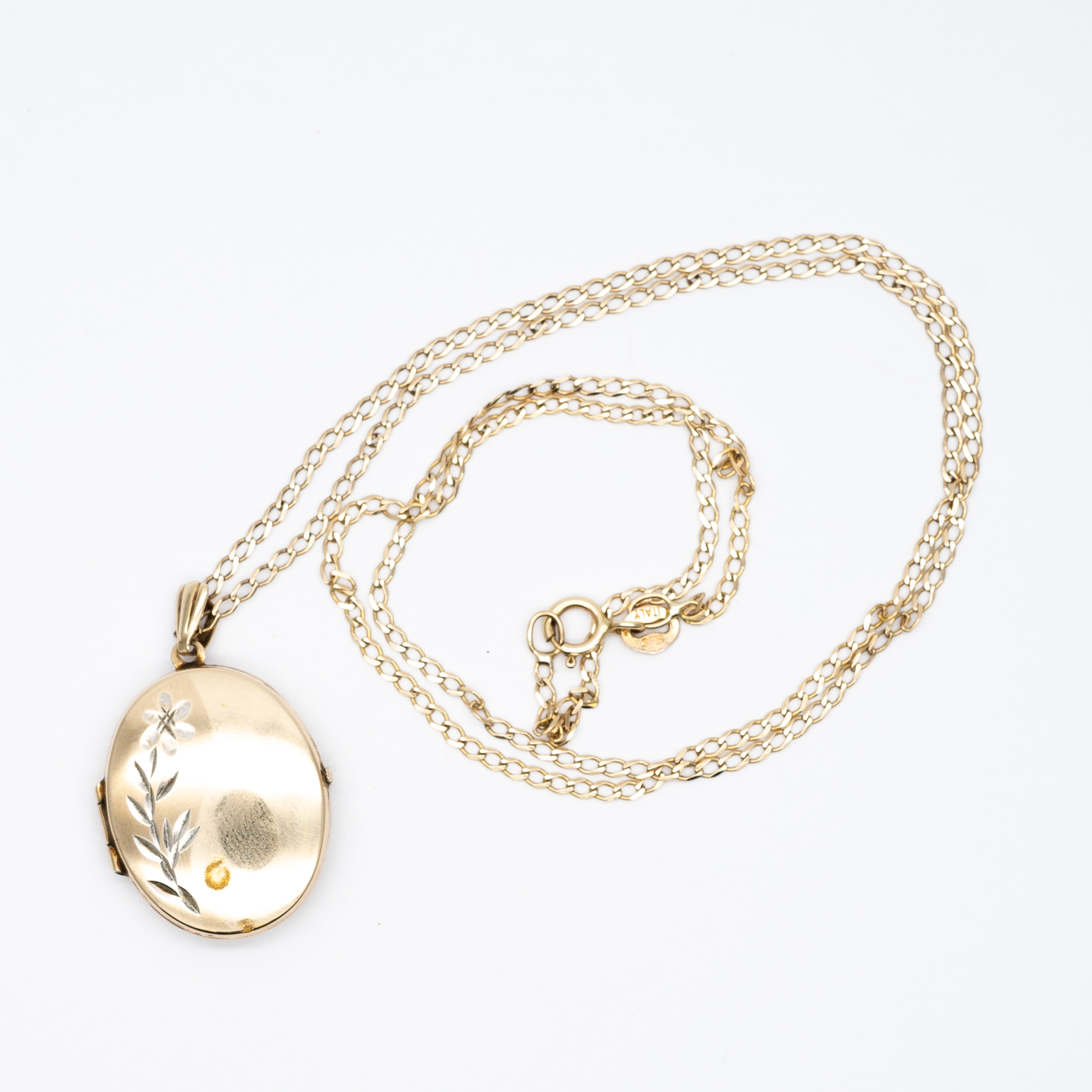 A 9ct yellow gold locket and chain