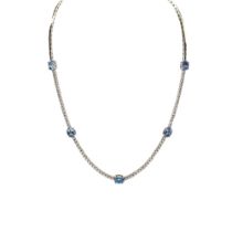 An 18ct white gold diamond and oval aquamarine necklace