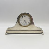 A vintage silver clock