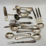 A collection of silver plated cutlery