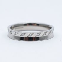 A platinum and diamond wedding band